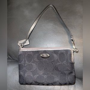 Black Coach Wristlet. New without tags